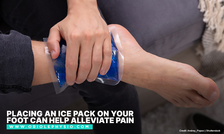 Placing an ice pack on your foot can help alleviate pain